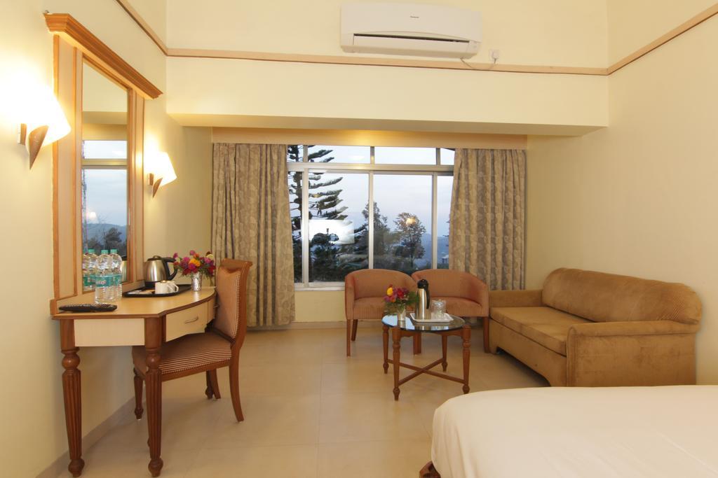 Aveda Blue Country Resort Panchgani Zimmer foto